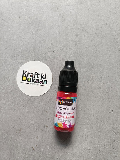 Alcohol ink bottle with black cap, bright red resin pigment label