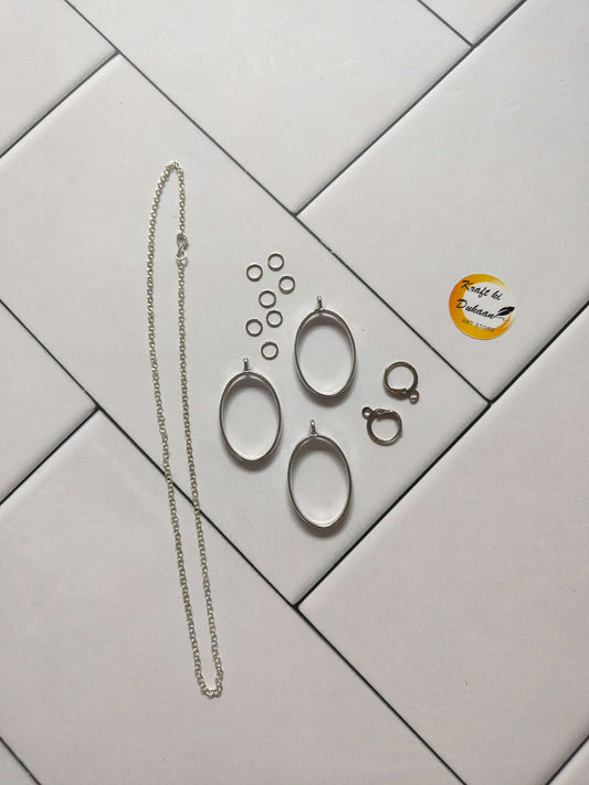 Oval earring necklace set: silver-tone chain necklace with oval drop earrings and small rings
