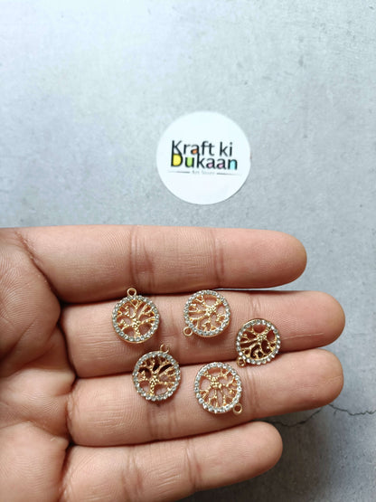 Set of 5 round gold-tone pendant charms with rhinestone border and loop tops