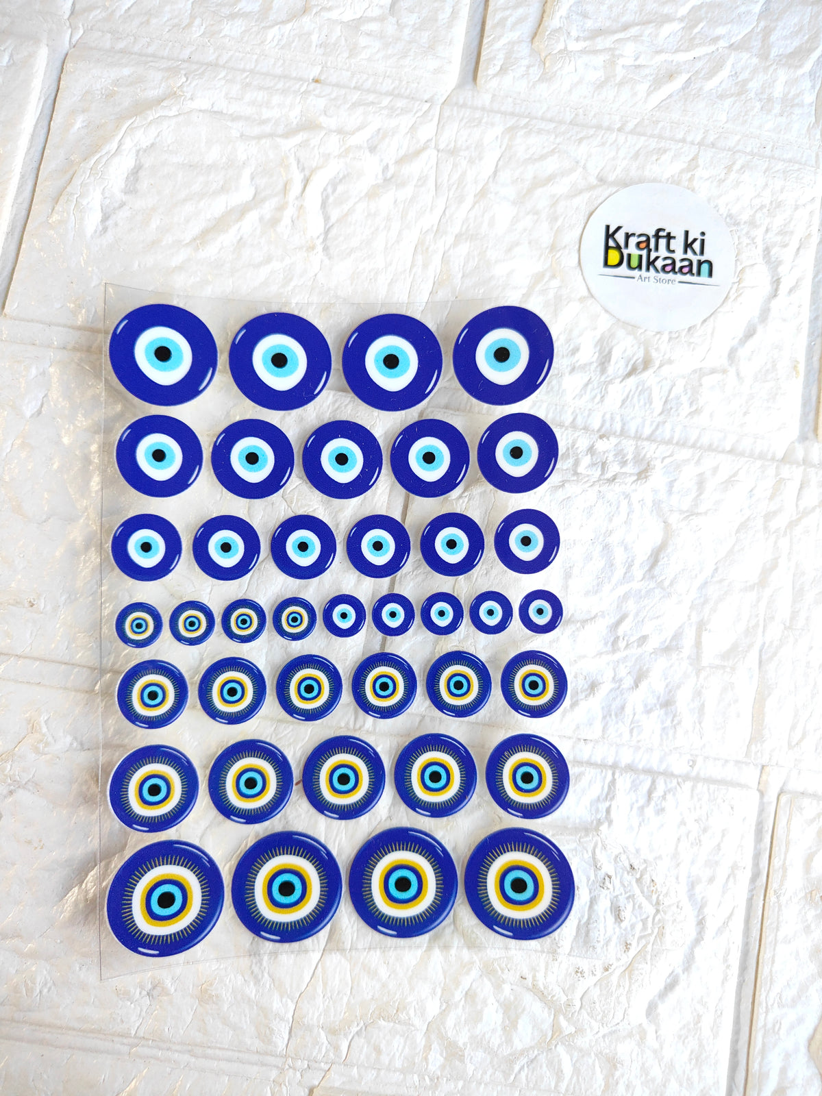 UV DTF peel-off sticker sheet with blue circular eye-pattern stickers