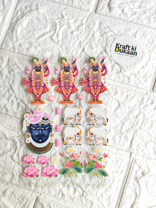 Colorful peel-off sticker sheet with deity figures, elephants, and floral designs