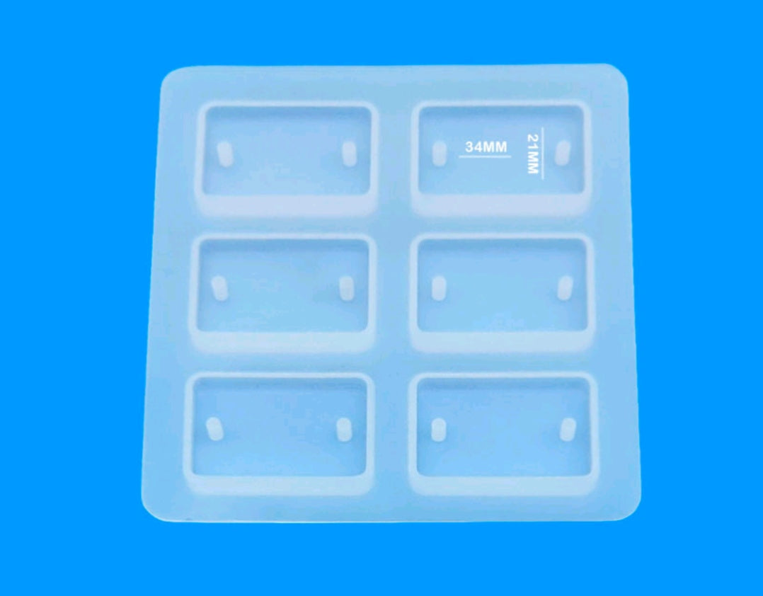 Light blue 6-cavity rectangular rakhi mould with six rectangular cavities