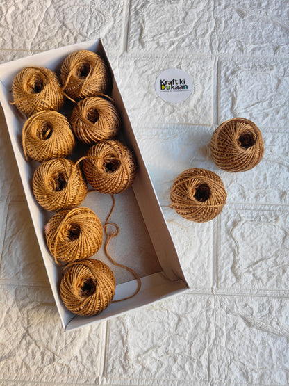 Rakhi thread roll set, tan-brown yarn balls with loose thread ends