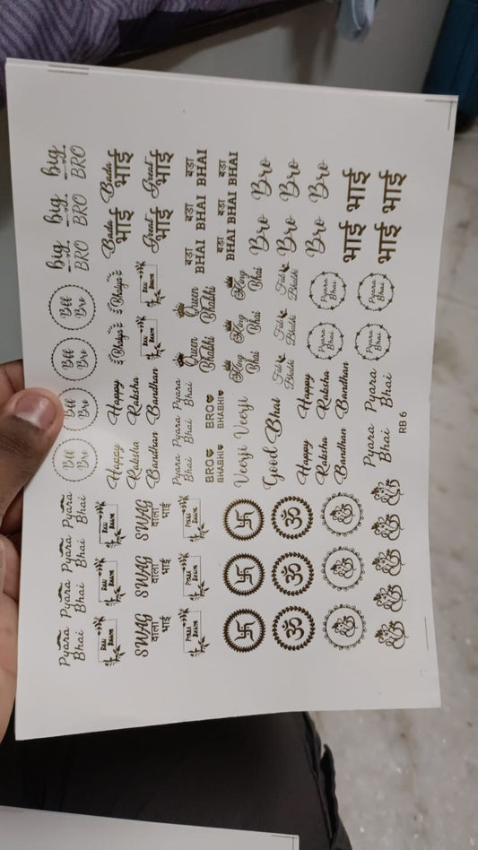 Gold embossed sticker sheet with small decorative icons and circular number-style symbols