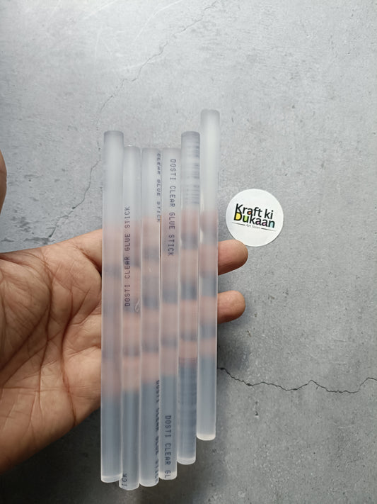 Hot glue stick pack with 4 clear translucent sticks, cylindrical tips
