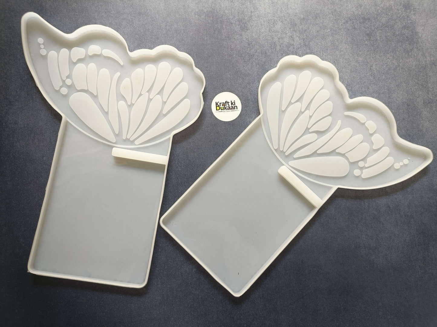 Butterfly book stand mold, white butterfly cutout, fan detailing, two molds shown