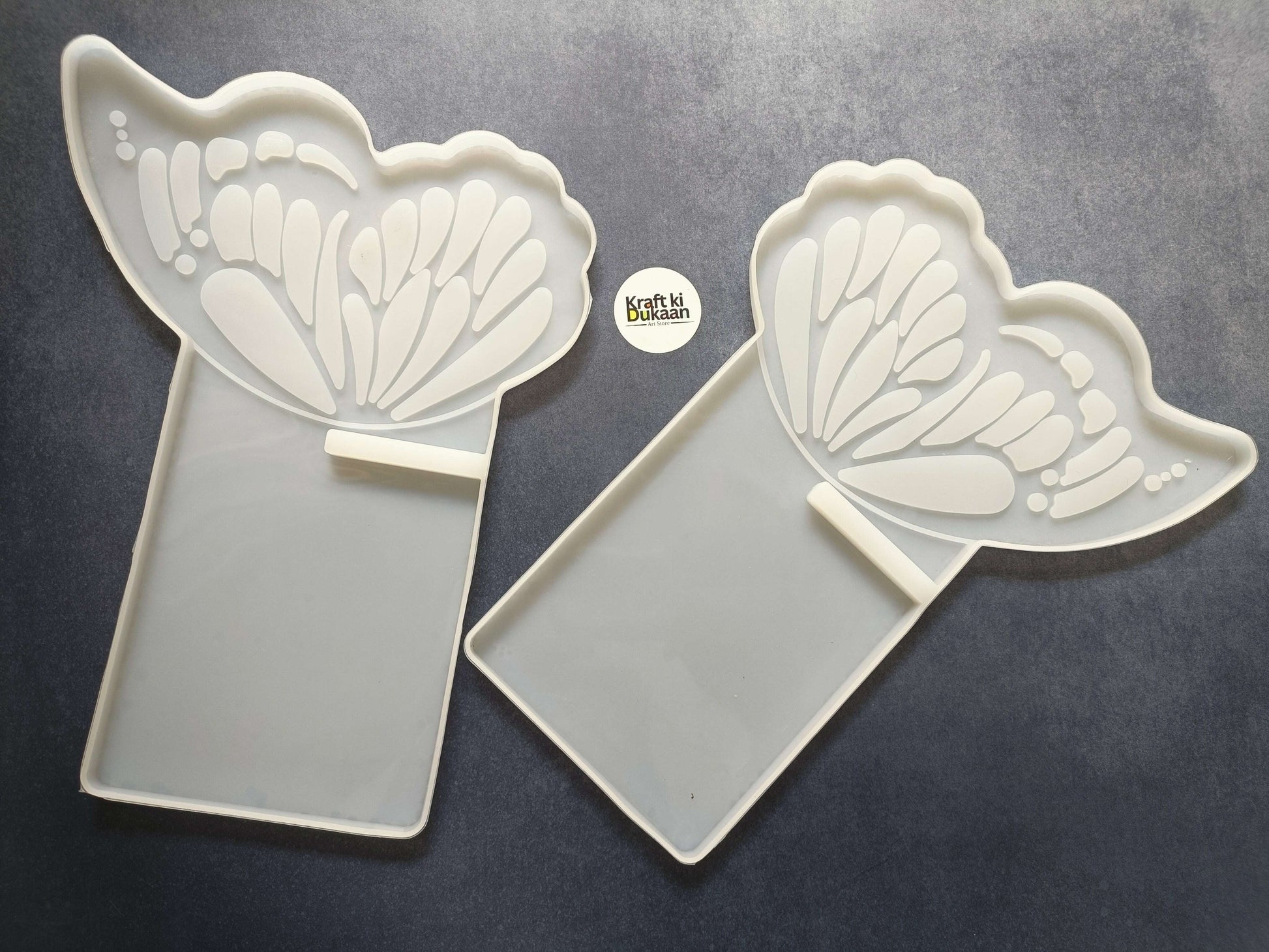 Butterfly book stand mold, white butterfly cutout, fan detailing, two molds shown