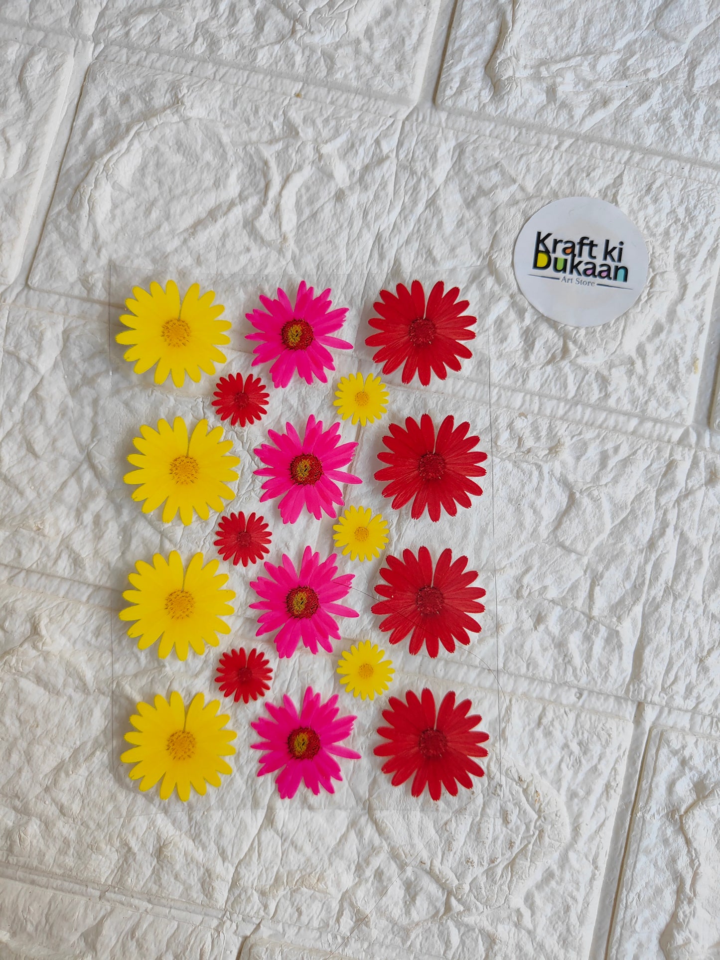 Peel-off sticker sheet with red, pink, and yellow flower decals