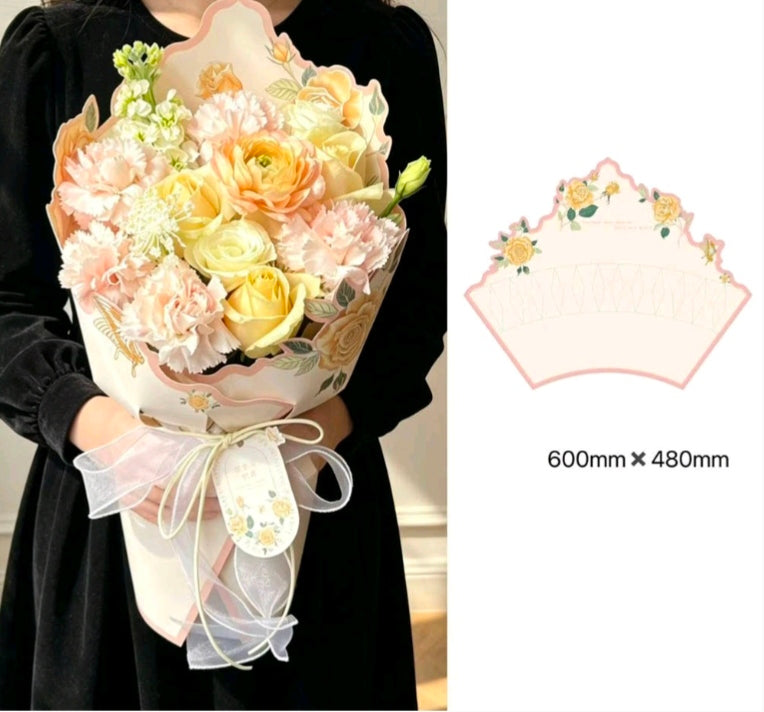 Scalloped floral cardboard wrap for flower bouquet, pastel cream with light pink accents