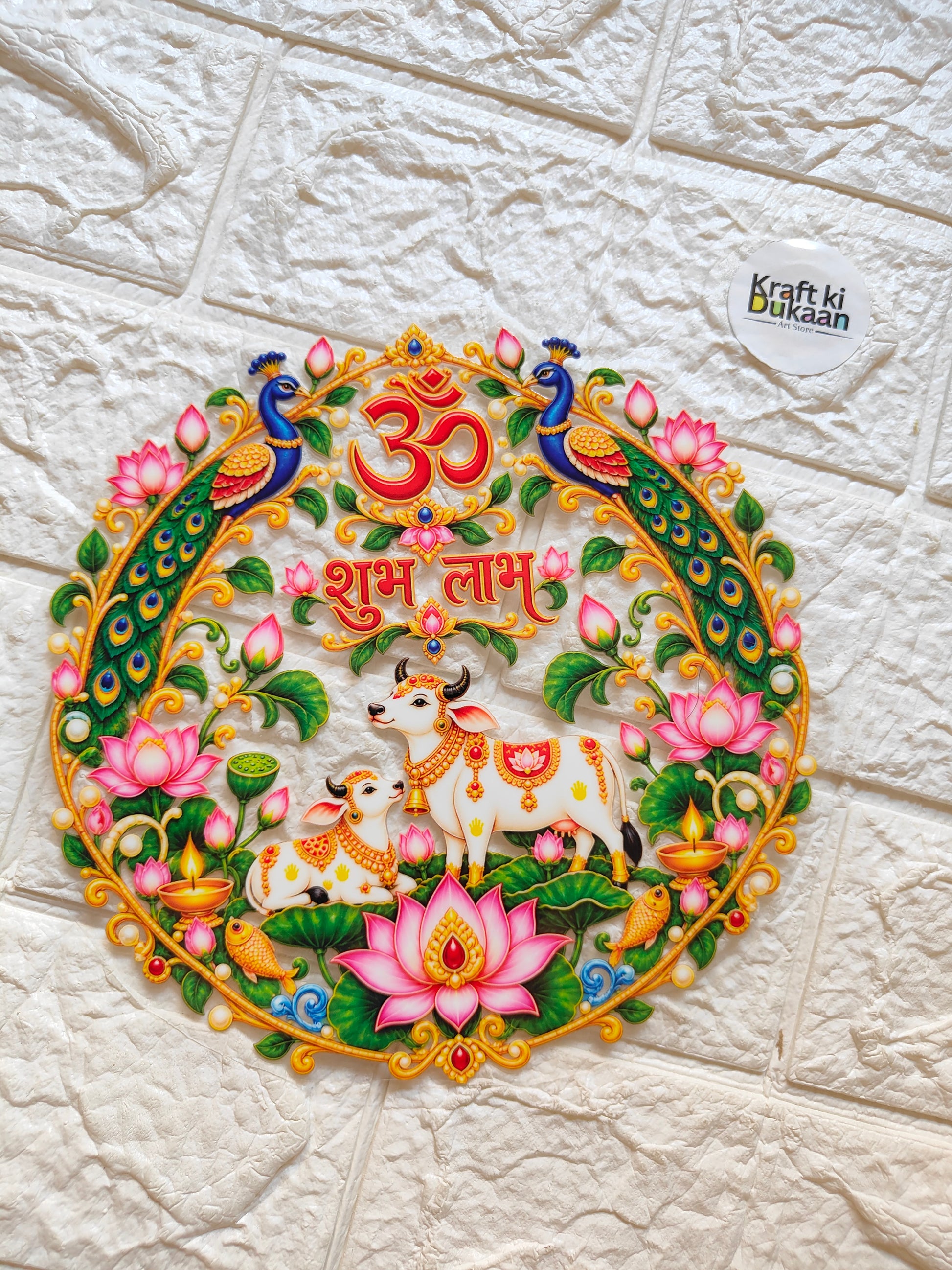 Round peel-off sticker with colorful deity art, elephants, lotus flowers, and ornate border