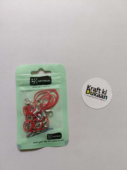 Red cord keychain set with lobster clasps, metal clips on a card pack.