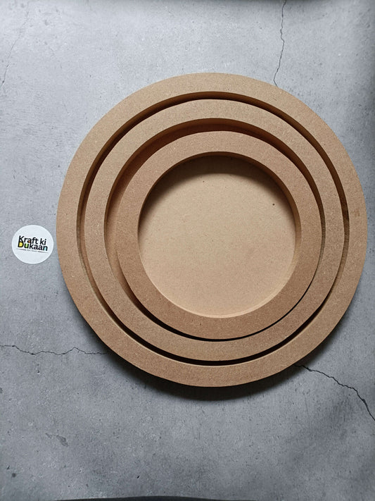MDF round wall mural with stacked concentric rings in tan and dark brown