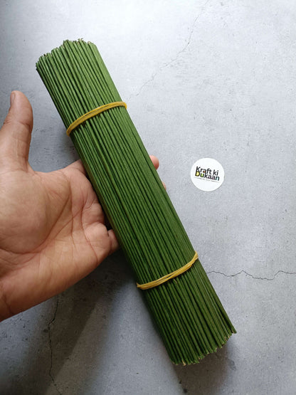 Green floral tape coated wire sticks bundle, tied with tan band