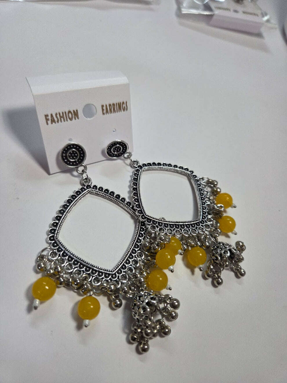 Kashmiri silvery square jhumka earrings with yellow beads and dangling bells