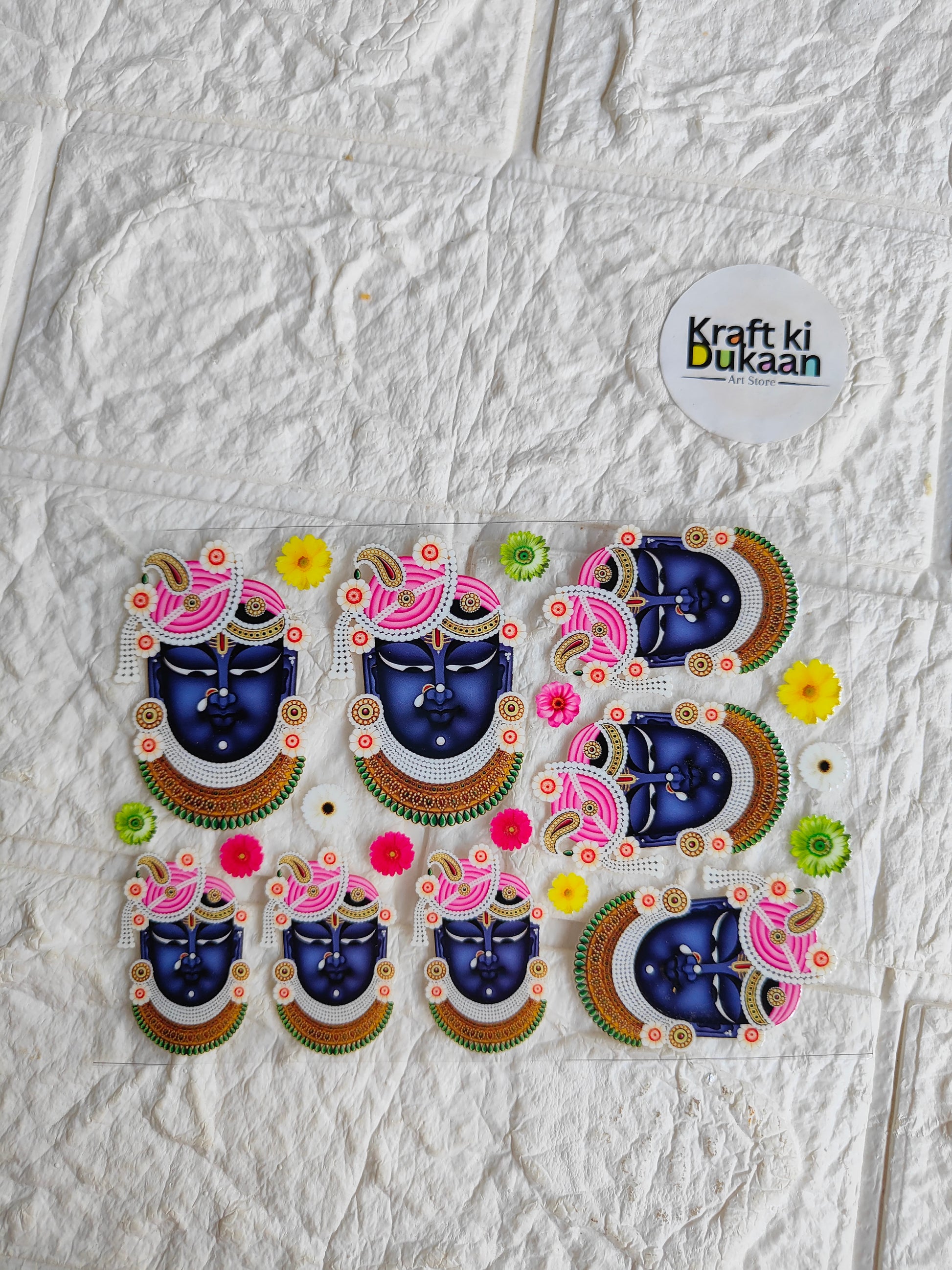 UV DTF peel-off sticker sheet with multiple colorful decorative stickers, blue motif and floral details