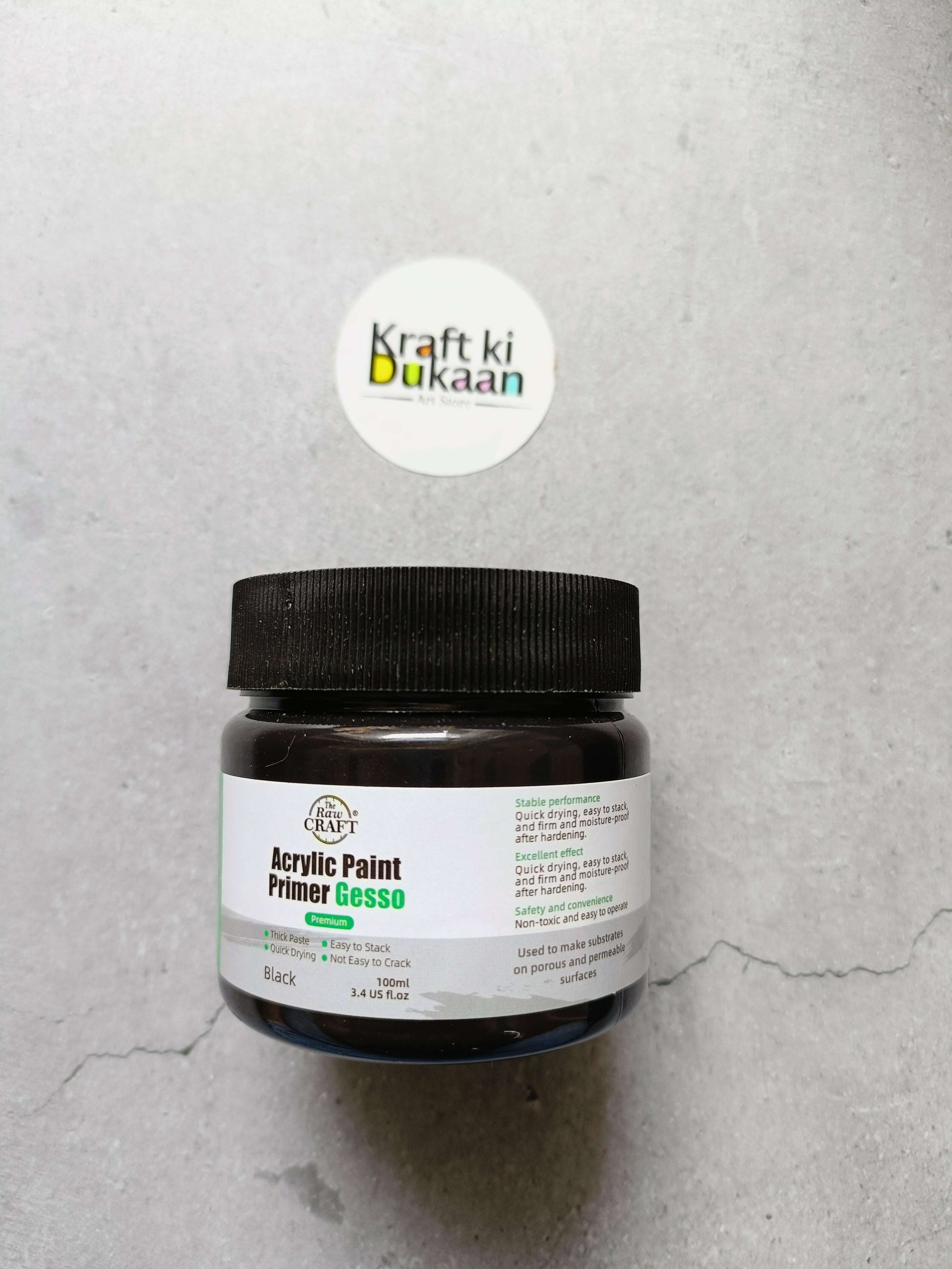 Black acrylic gesso primer paint in 100 ml jar with flip-top lid