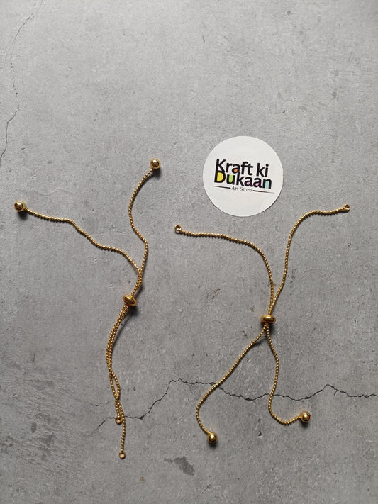 Gold bracelet chain set of 5, separate chains laid out with small beads