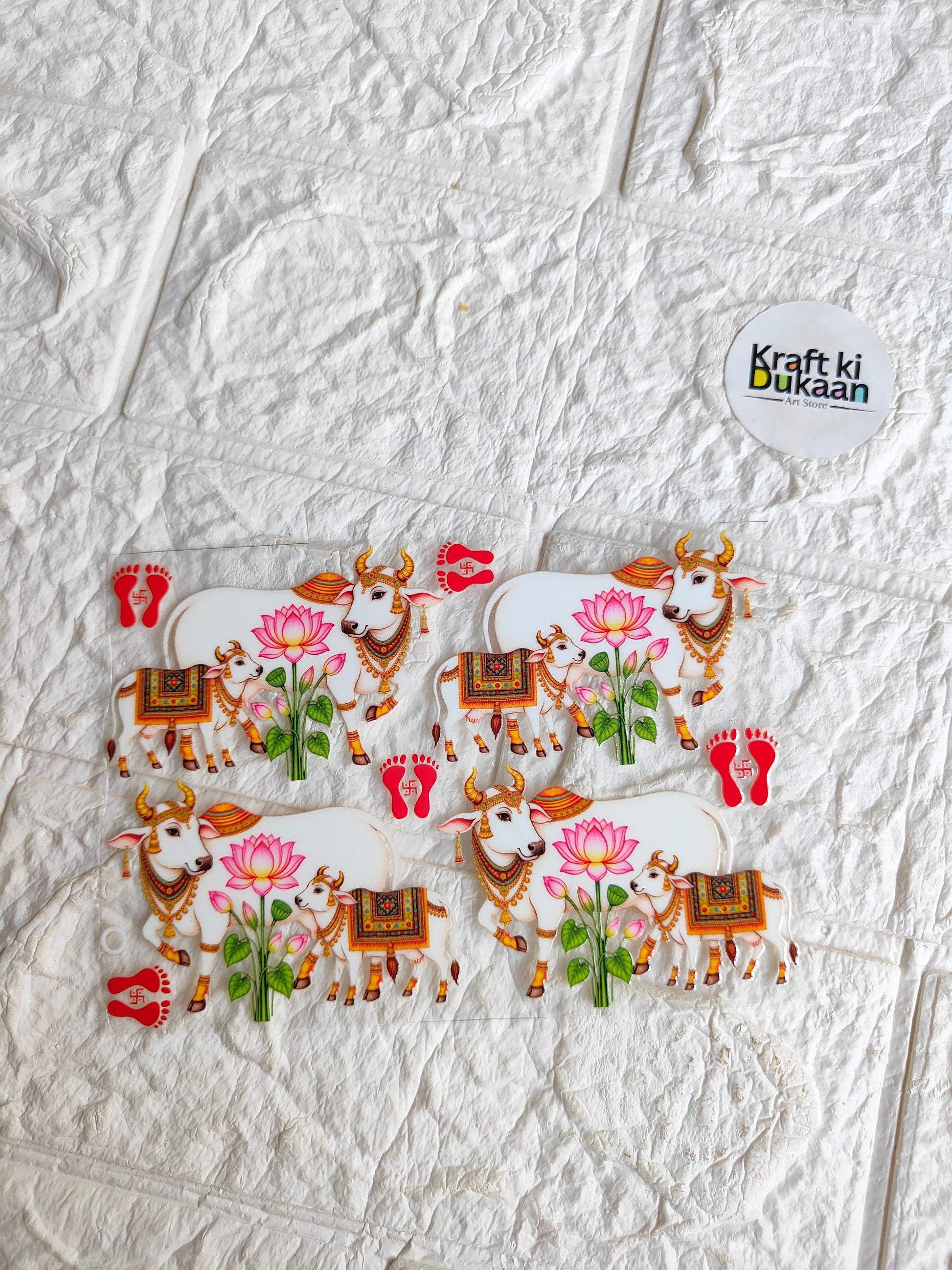Peel-off UV DTF sticker sheet with colorful cow and lotus flower designs