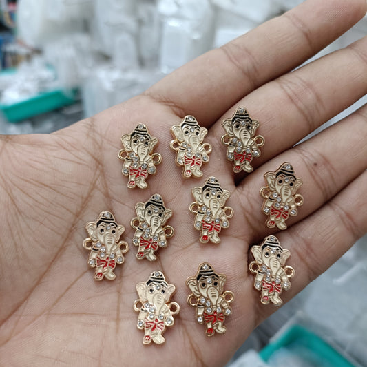 Set of 10 Ganesha rakhi bracelet pendants, gold-tone with red accents