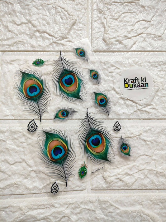 Peel-off sticker sheet with peacock feather pattern in green, teal, and blue