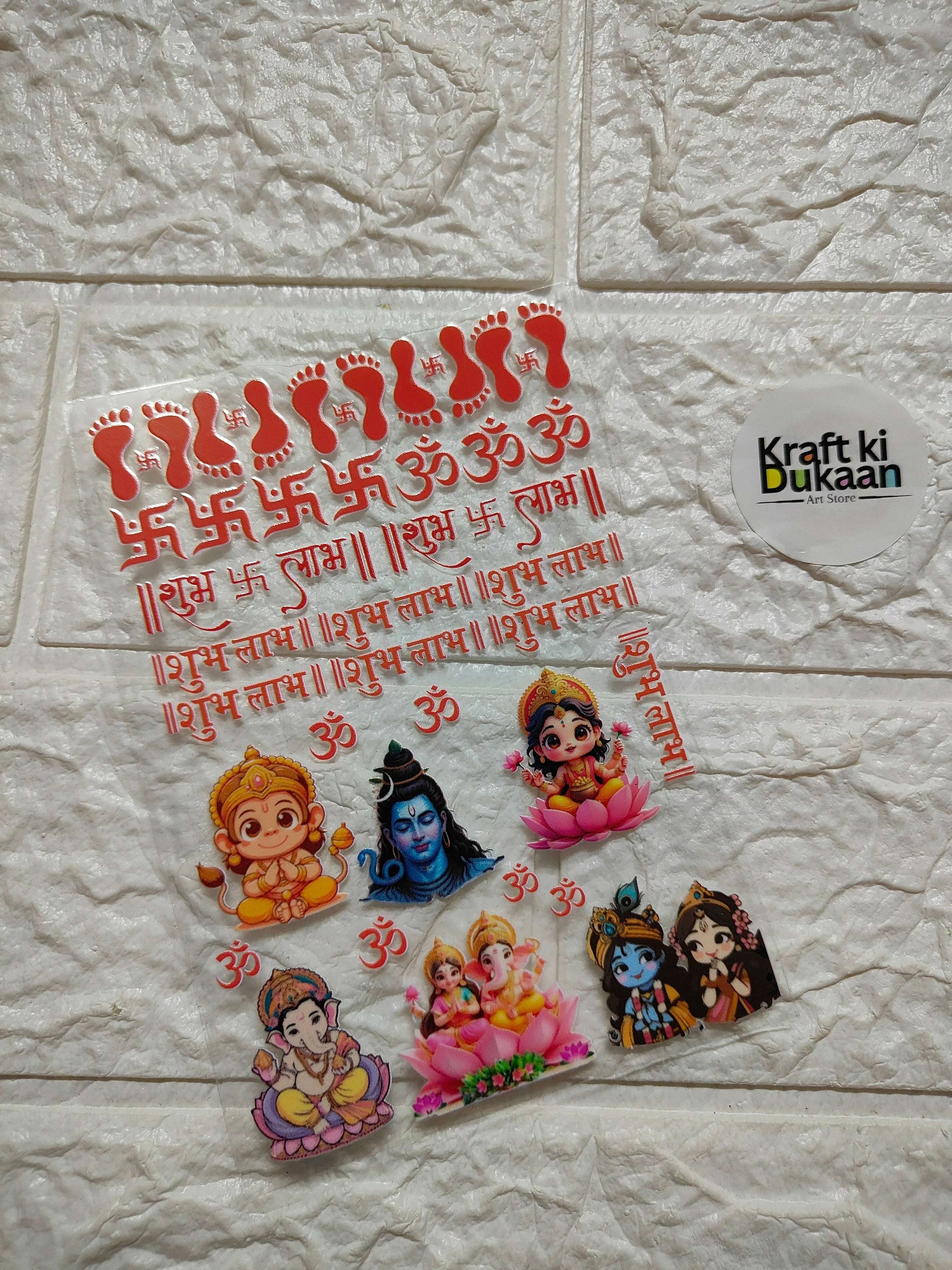 Peel-off sticker sheet with red Hindi text and small cartoon deity figures
