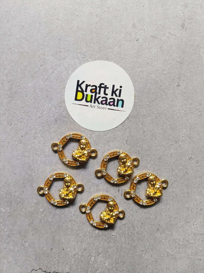 Set of round gold-toned bezel rakhi bracelet charms with rhinestone border and side loops