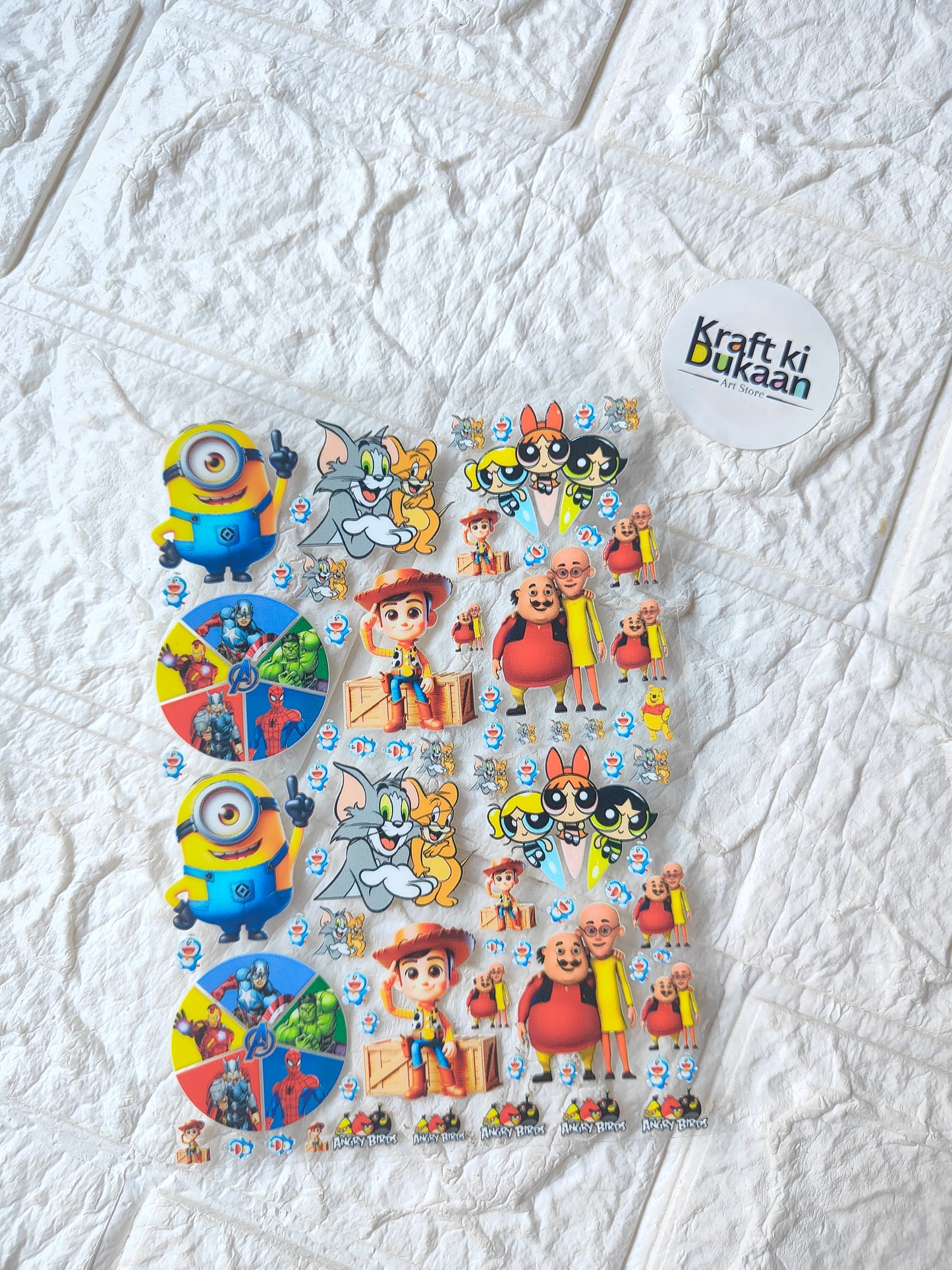 Peel-off sticker sheet with colorful cartoon character designs, multiple cutout shapes