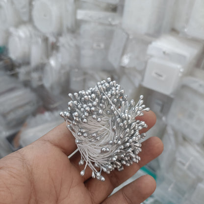 Silver artificial pollen spray with clustered bead-like florets and wire stems