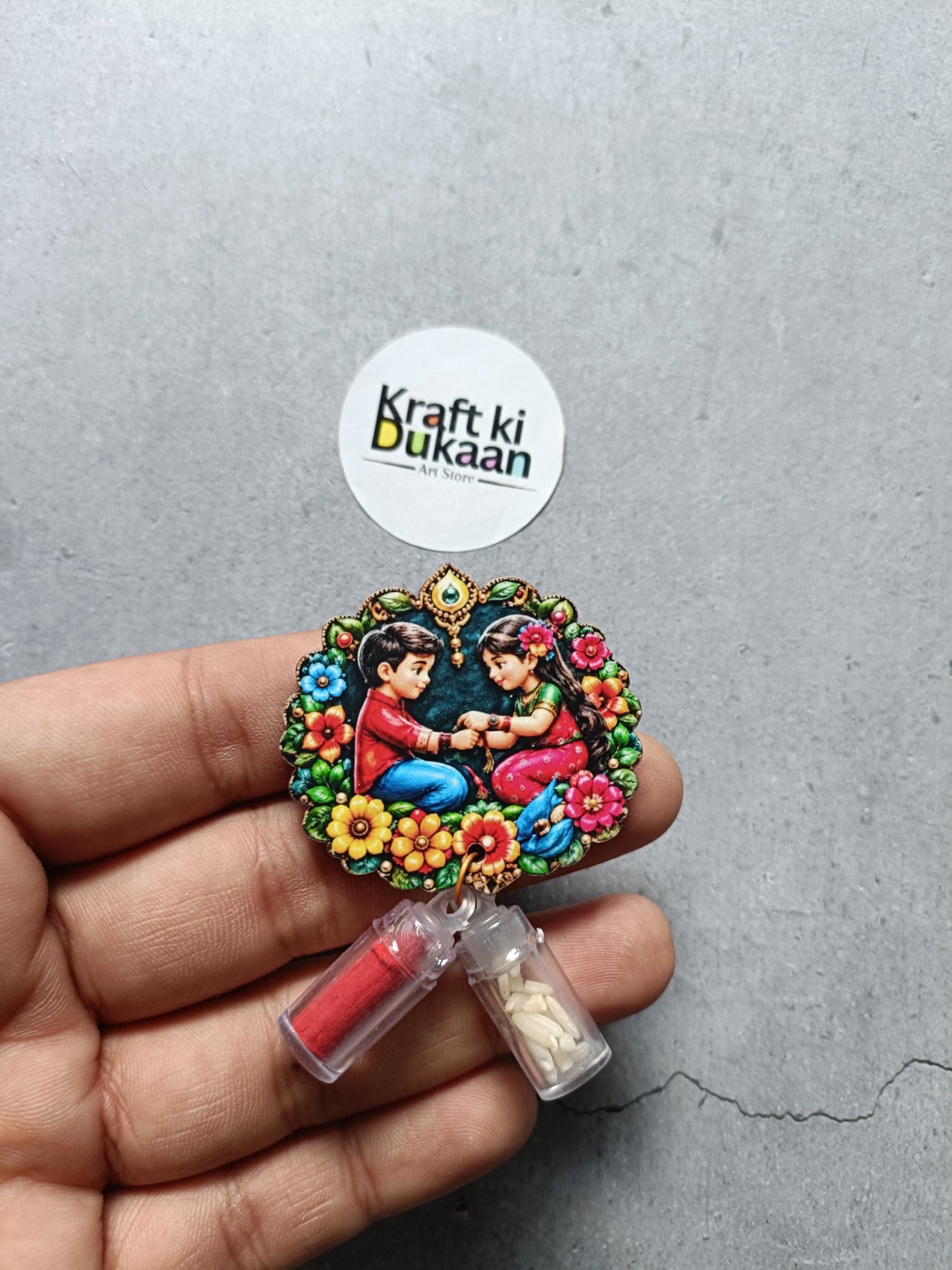 Roli and chawal bottle set with floral round charm and two small colored vials