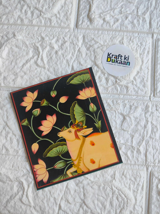 Mini sticker sheet with black background, colorful flowers and leaves and a gold deer illustration