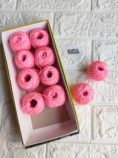 Rakhi thread spool set in light pink, open box with multiple thread spools and extra spool