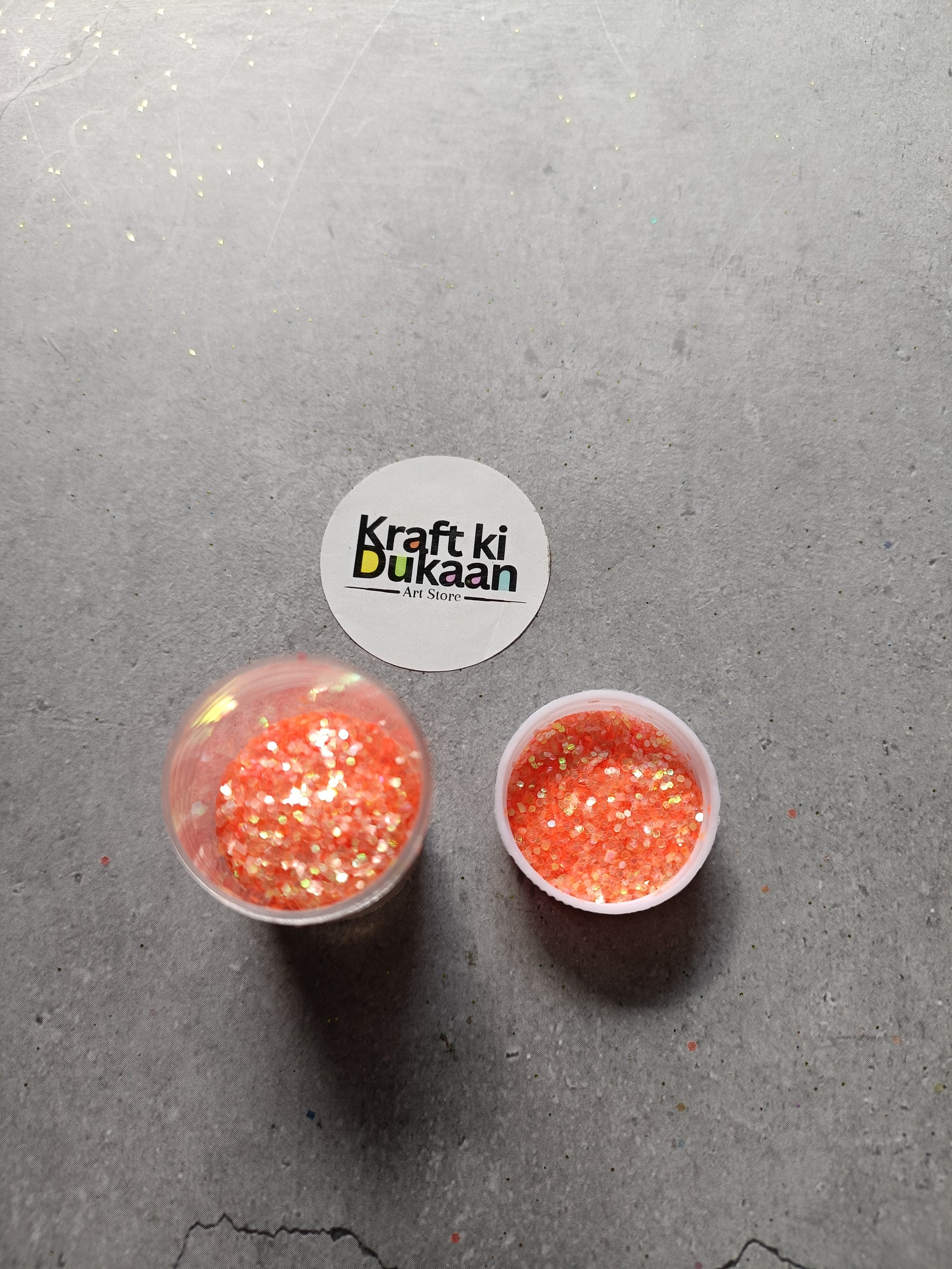 Two small red holo glitter cups
