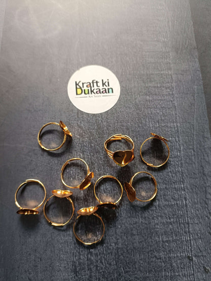 Gold ring bases with heart-shaped top rings
