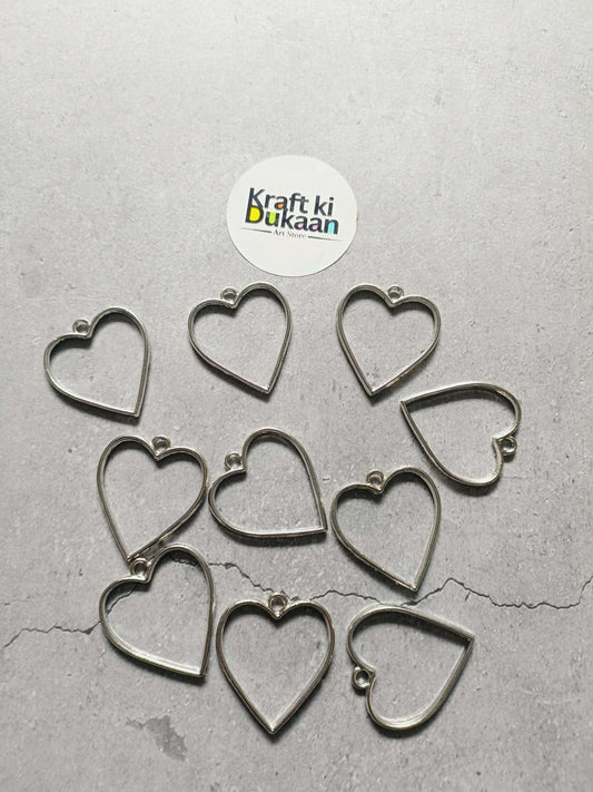 Heart bezel pendant set of 10, silver tone plain heart frames.