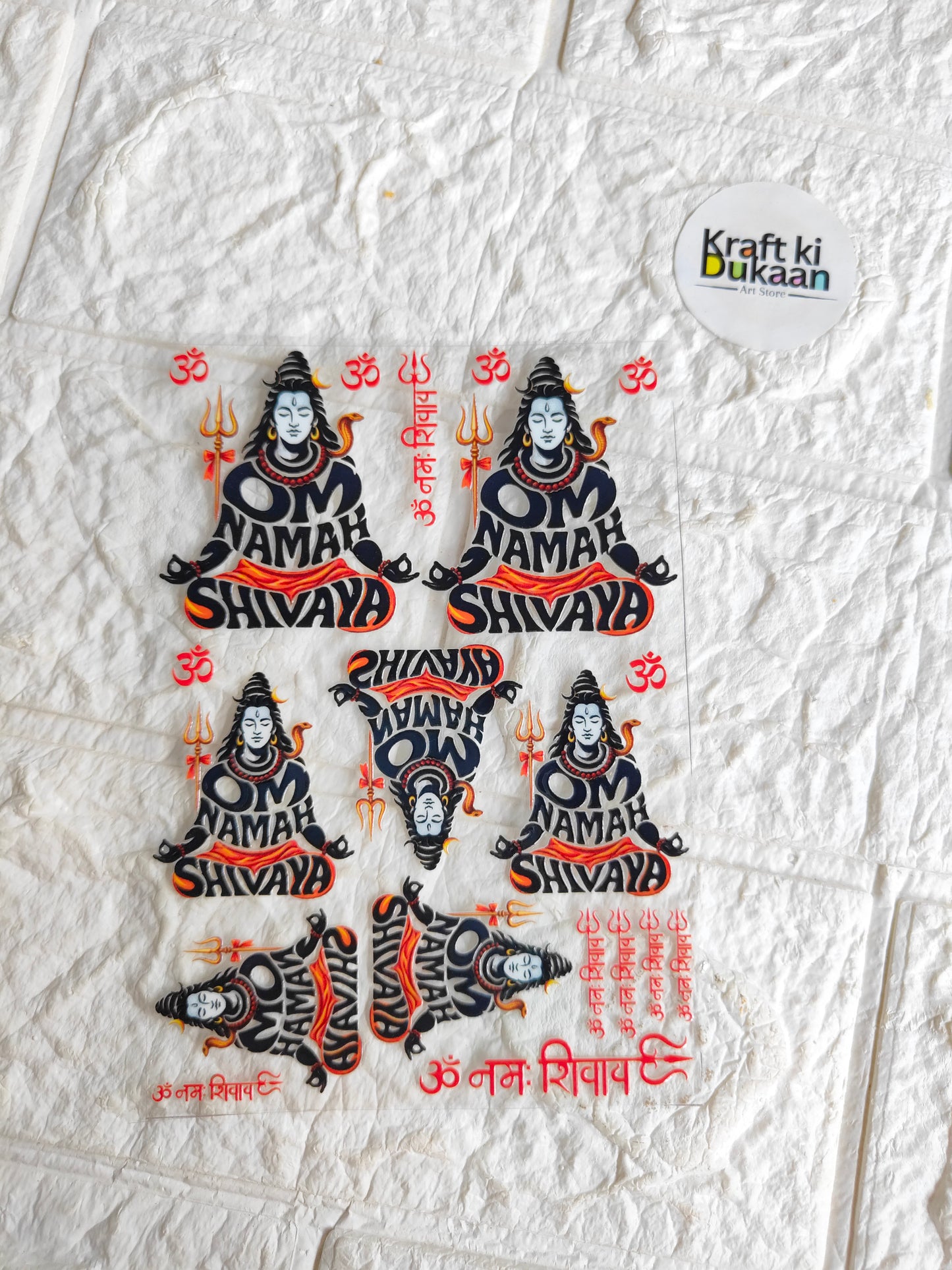 Peel-off sticker sheet with Shiva Namah figures, blue faces, red and orange flames