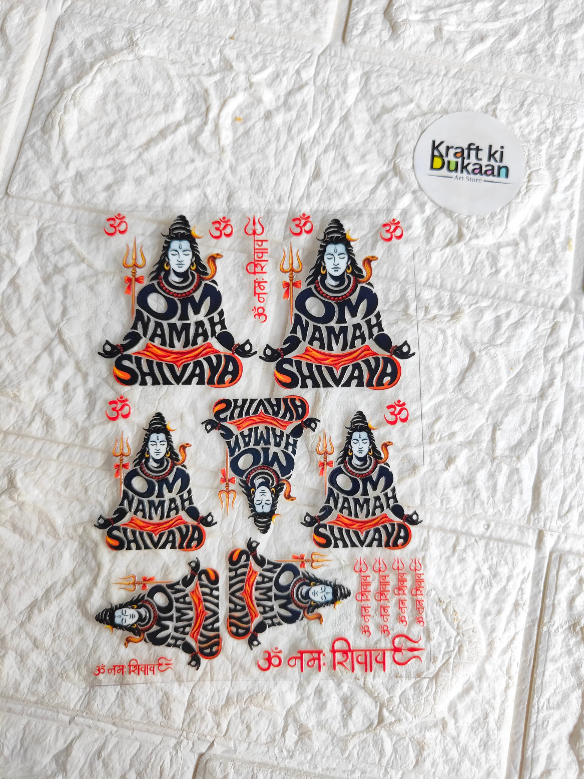 Peel-off sticker sheet with Shiva Namah figures, blue faces, red and orange flames