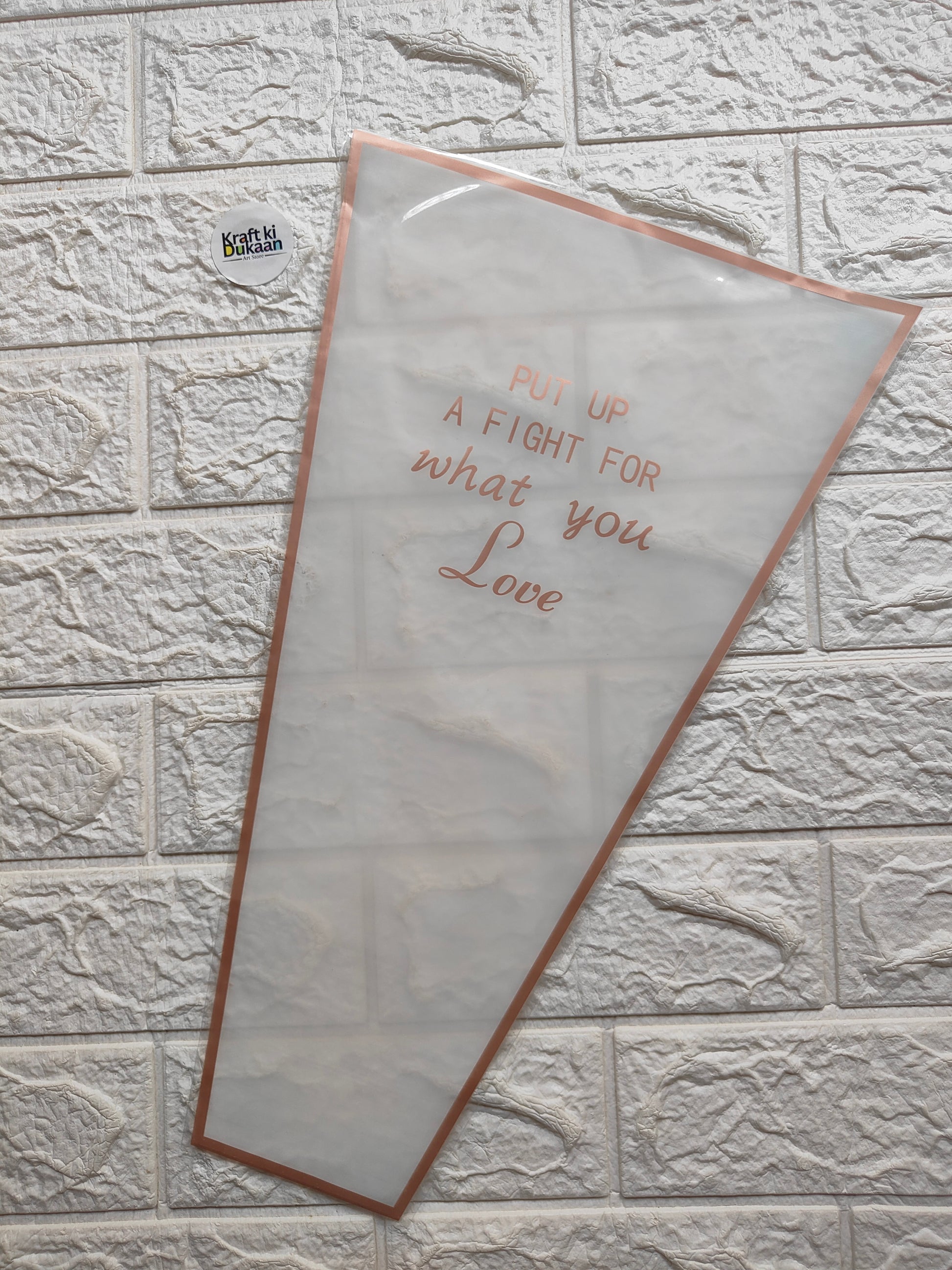 Bouquet cover sleeve in white with orange trim and “Love” text