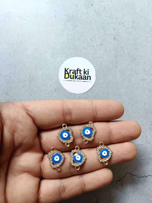 Set of five evil eye bracelet charms with blue enamel and gold-tone frames