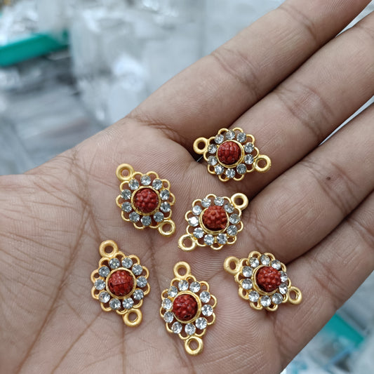 Gold-tone rakhi pendant set of 6, red flower cabochon with clear stone detail