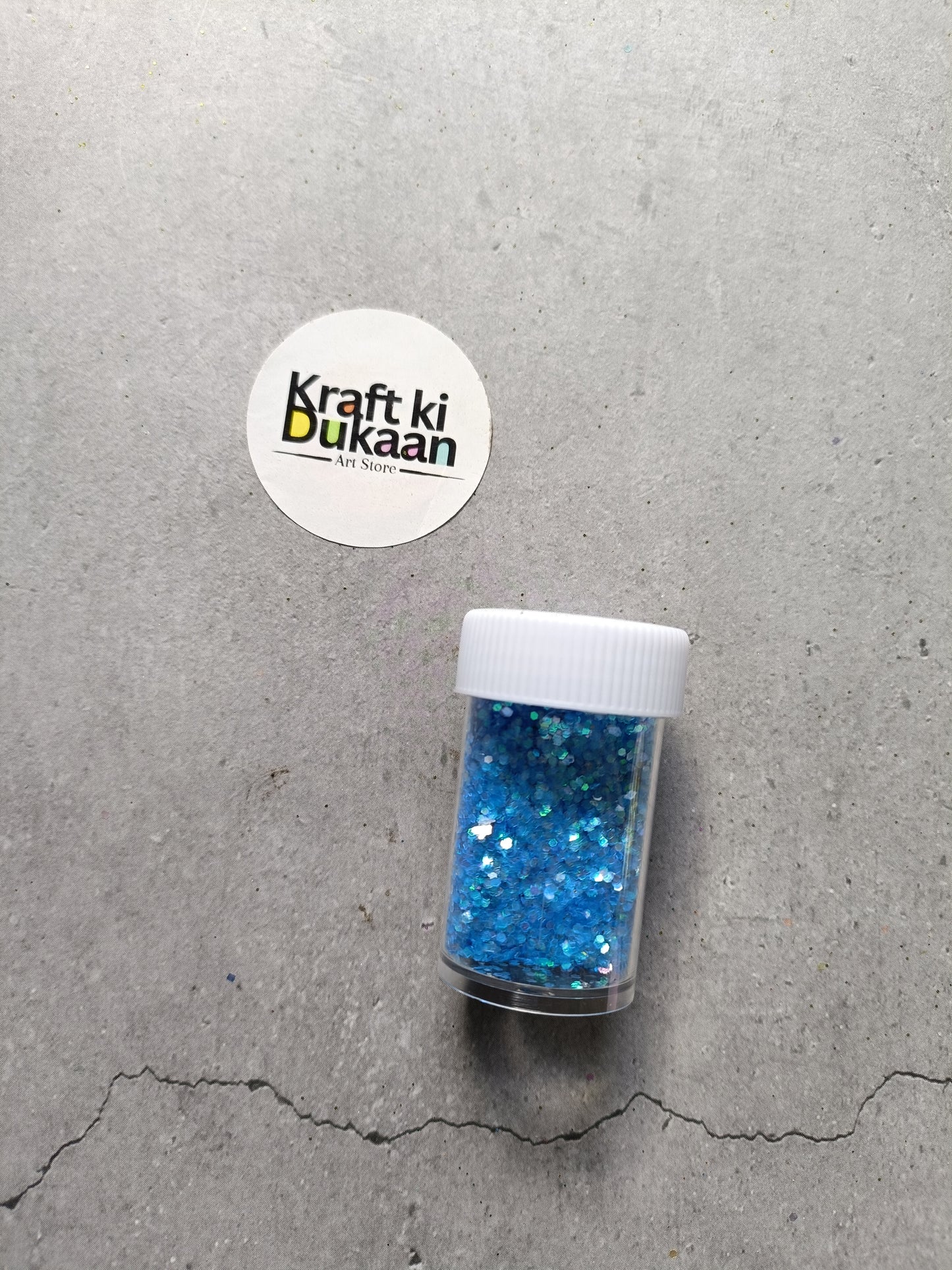 Blue holo glitter jar with white ribbed lid