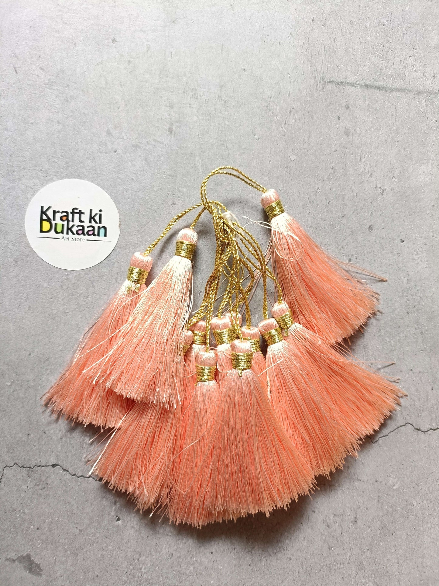 Silk tassel set of 12 peach-pink tassels with gold caps and hanging loops