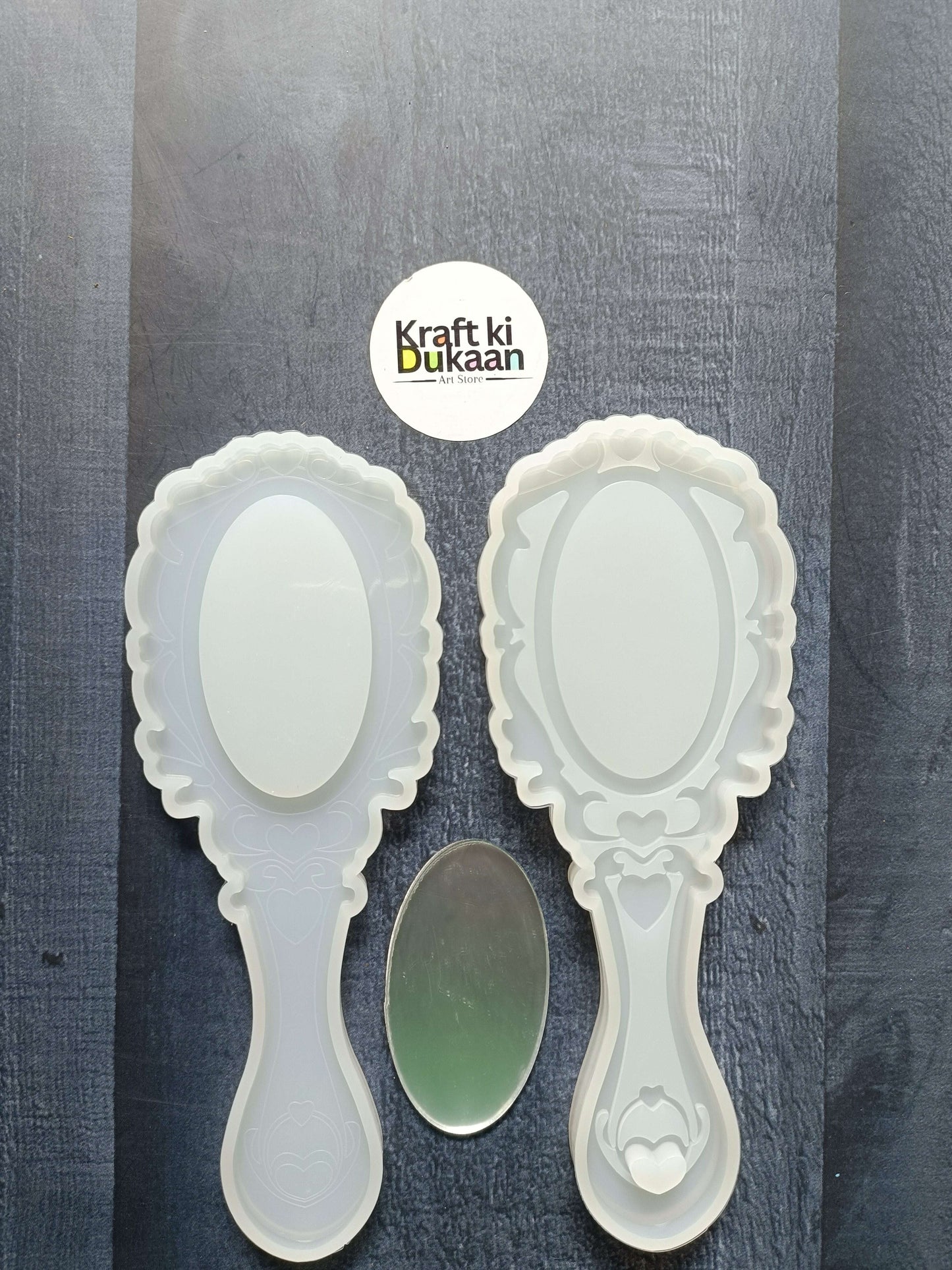 2-piece mirror mould set with two white ornate hand mirrors and oval mirror panels