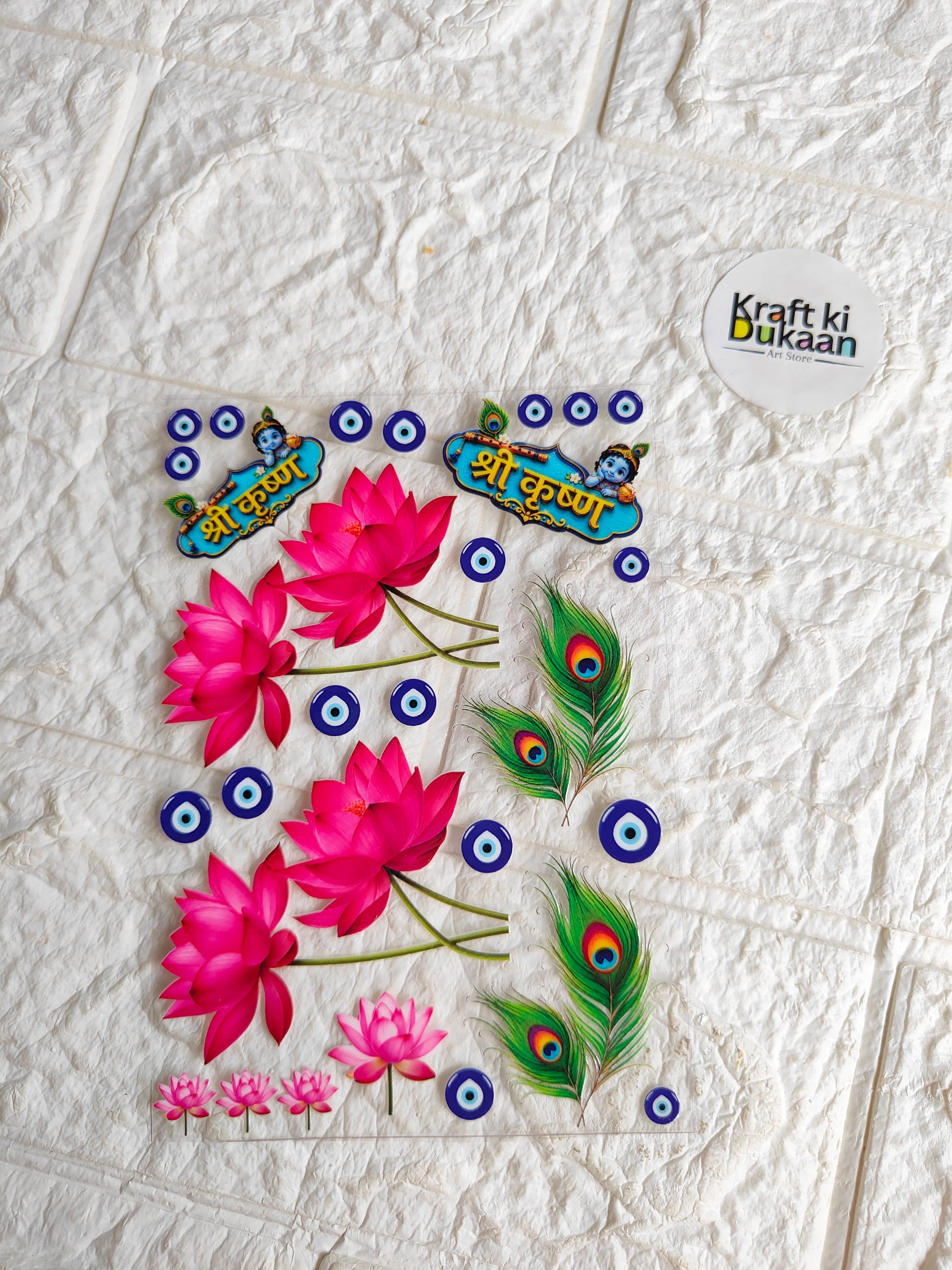 Decorative peel-off sticker sheet with peacock feathers and pink floral accents