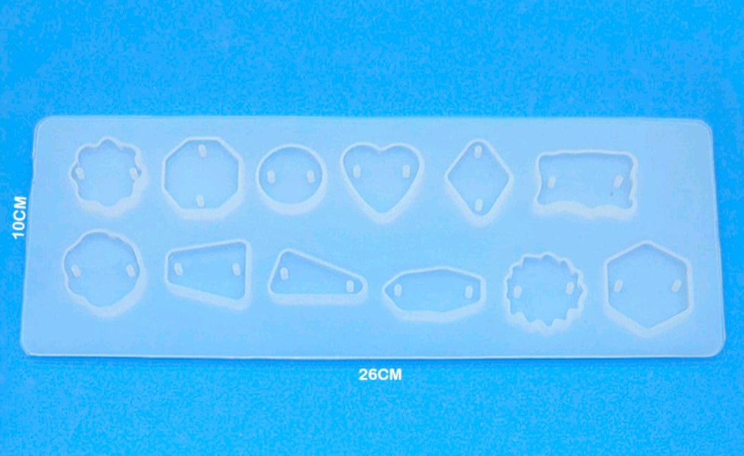 12-cavity rakhi mould with multiple outline compartments in a rectangular tray
