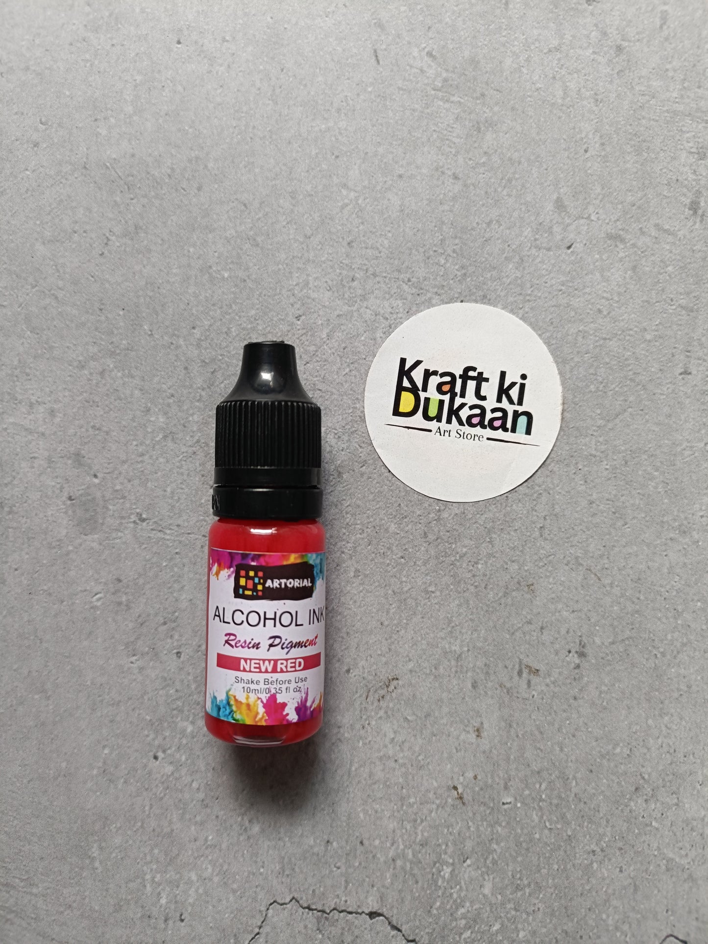 Alcohol ink bottle with black cap, new red resin pigment label