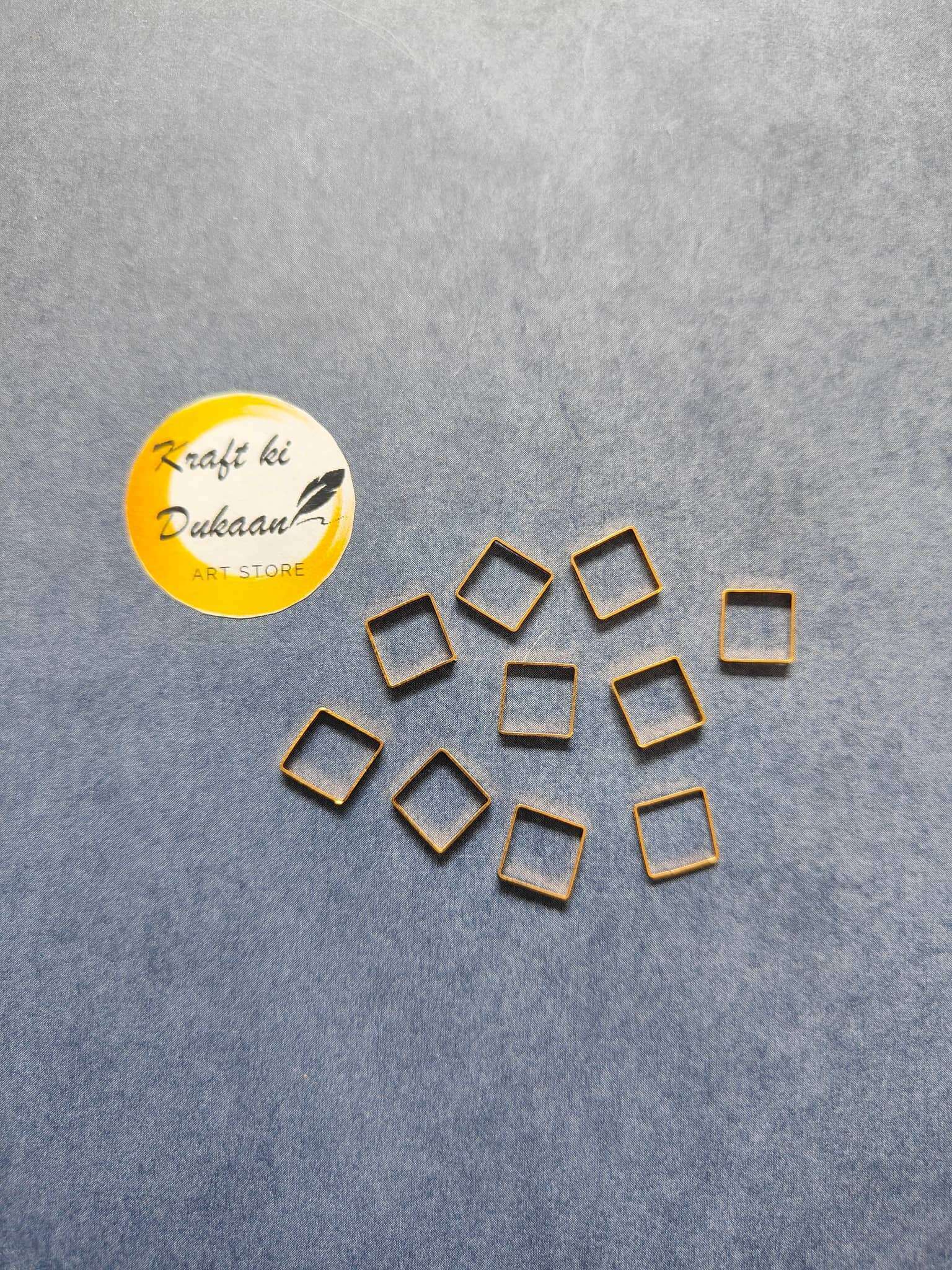 Square bezel set of 10: gold-tone square frames with blue-toned inner tiles