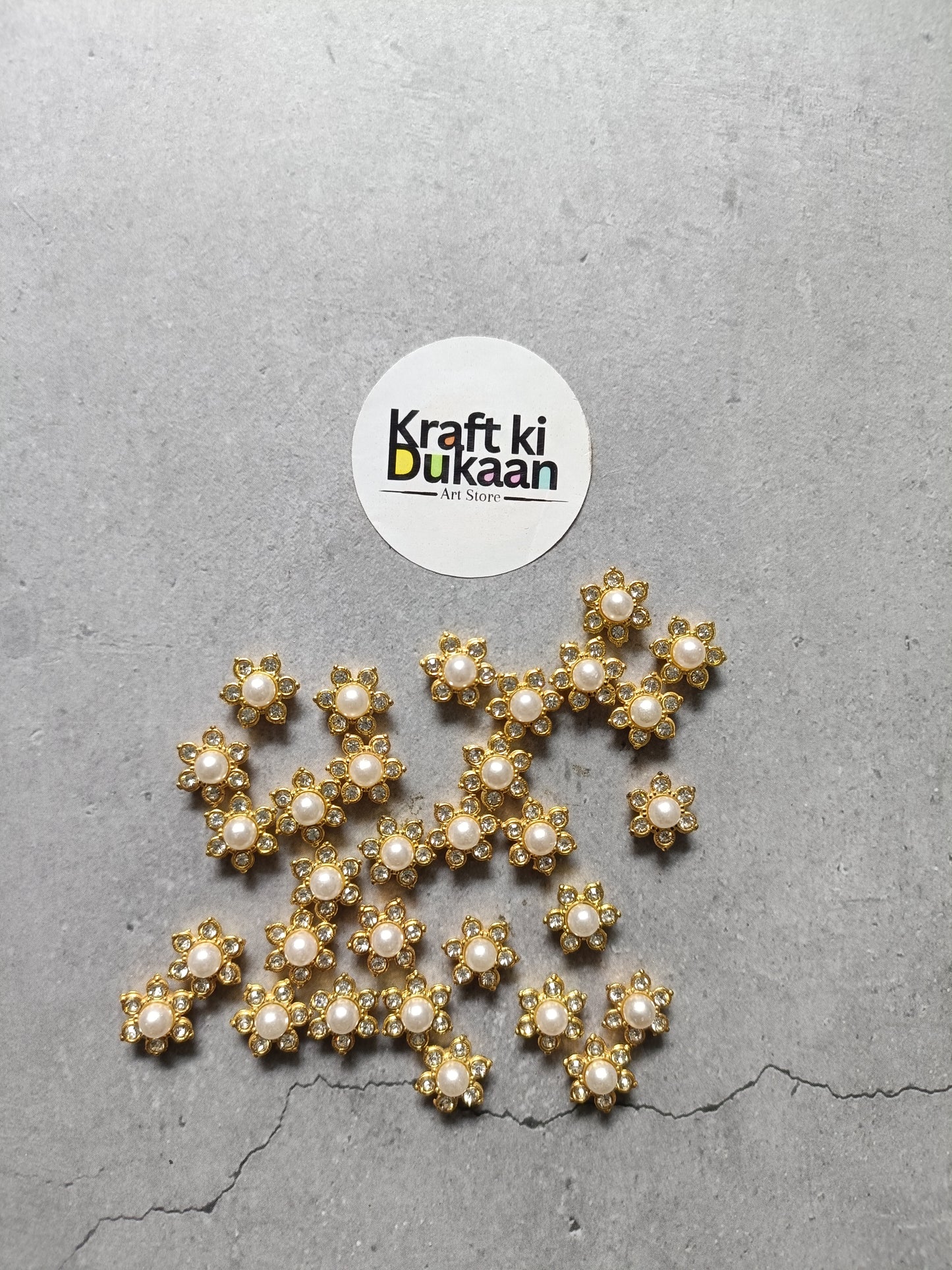 Gold pearl diamond beads with clustered round settings and white pearl centers