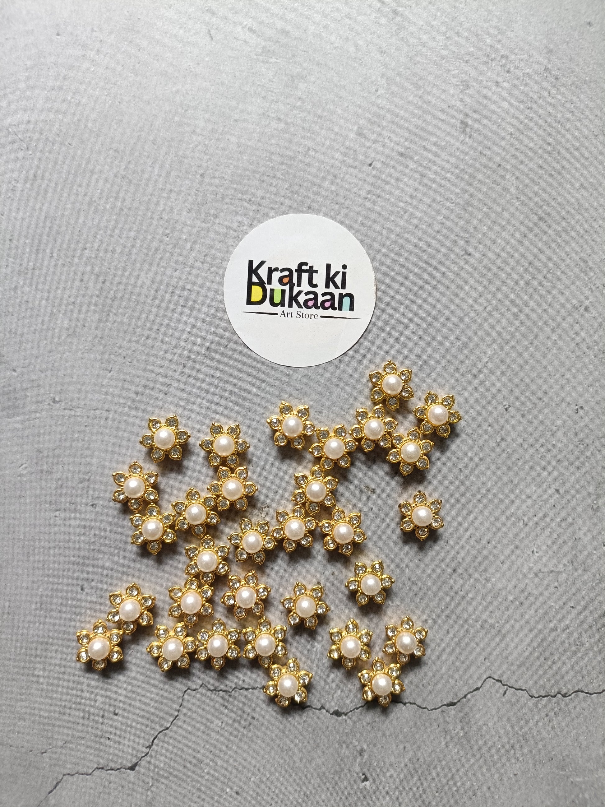 Gold pearl diamond beads with clustered round settings and white pearl centers