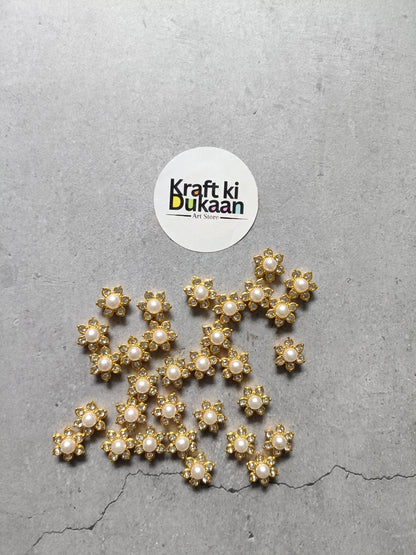 Gold pearl diamond beads with clustered round settings and white pearl centers