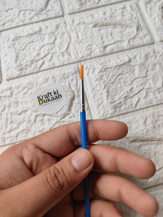Round artist paint brush with blue handle, silver ferrule, and orange bristle tip